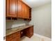 Built-in office space with granite countertop and wood cabinets at 36750 Us Highway 19 N # 04221, Palm Harbor, FL 34684