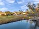 House with a fenced backyard and a view of a lake at 3870 155Th E Ave, Parrish, FL 34219