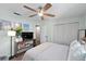 Cozy bedroom with a queen bed and ample closet space at 408 S Arrawana Ave # C4, Tampa, FL 33609