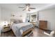 Guest bedroom with a queen bed and neutral decor at 408 S Arrawana Ave # C4, Tampa, FL 33609