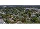 Aerial perspective of a house among other homes, showcasing the neighborhood at 4224 W Kensington Ave, Tampa, FL 33629