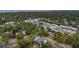 Aerial view highlighting a home's location in a tree-lined neighborhood near shops at 4224 W Kensington Ave, Tampa, FL 33629