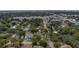 Aerial view of a house in a quiet neighborhood near the water at 4224 W Kensington Ave, Tampa, FL 33629