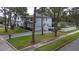 Two-story house with light gray siding, landscaping, and a paved driveway at 4224 W Kensington Ave, Tampa, FL 33629