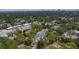 Aerial view showing a home's location in a residential neighborhood with city views at 4224 W Kensington Ave, Tampa, FL 33629