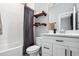 Clean bathroom with white subway tile and a shower/tub combo at 4224 W Kensington Ave, Tampa, FL 33629