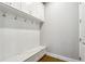 Convenient mudroom with bench, storage, and hooks at 4224 W Kensington Ave, Tampa, FL 33629