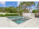 Inviting pool and spa with expansive patio at 4224 W Kensington Ave, Tampa, FL 33629