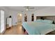 Spacious bedroom with light flooring and a large bed at 4333 Trails Dr # 10-1, Sarasota, FL 34232