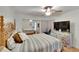 Bright bedroom with ceiling fan, dresser, and rocking chair at 4333 Trails Dr # 10-1, Sarasota, FL 34232