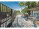 Deck with tables and chairs, next to the pool at 4333 Trails Dr # 10-1, Sarasota, FL 34232