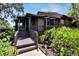 Elevated walkway leading to screened porch entrance at 4333 Trails Dr # 10-1, Sarasota, FL 34232