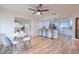 Open concept dining area with hardwood floors and kitchen access at 4702 W Bay Ave, Tampa, FL 33616