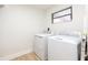 Laundry room with washer and dryer at 4702 W Bay Ave, Tampa, FL 33616