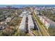 Aerial view of townhouses near water and railway at 4722 Legacy Park Dr, Tampa, FL 33611