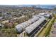 Aerial view of townhouses near water and railway at 4722 Legacy Park Dr, Tampa, FL 33611