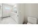 Clean bathroom with shower and toilet; bright and airy at 4722 Legacy Park Dr, Tampa, FL 33611