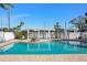 Sparkling community pool with white pergola at 4722 Legacy Park Dr, Tampa, FL 33611