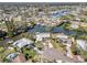 Picturesque aerial capture of waterfront homes with canals, featuring a desirable neighborhood layout at 4801 Venetian Ne Pl, St Petersburg, FL 33703