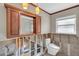 Bathroom with modern toilet, vanity, and a shower behind a glass door at 4801 Venetian Ne Pl, St Petersburg, FL 33703