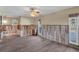 Large open living room featuring neutral tones and a ceiling fan at 4801 Venetian Ne Pl, St Petersburg, FL 33703