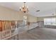 Living room featuring a chandelier and open layout at 4801 Venetian Ne Pl, St Petersburg, FL 33703