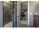 Bathroom with a large walk-in shower and grey tile at 5020 W Dickens Ave, Tampa, FL 33629