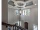 Elegant two-story foyer with chandelier and ornate staircase at 5020 W Dickens Ave, Tampa, FL 33629