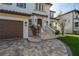 Elegant entryway with stone steps and landscaping at 5020 W Dickens Ave, Tampa, FL 33629