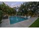 Tranquil pool area at sunset, great for evening relaxation at 5020 W Dickens Ave, Tampa, FL 33629