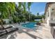 Large pool and patio area with plenty of seating at 5020 W Dickens Ave, Tampa, FL 33629