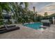 Serene pool area at dusk, ideal for sunset views at 5020 W Dickens Ave, Tampa, FL 33629