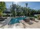 Spacious pool area with ample seating and lush landscaping at 5020 W Dickens Ave, Tampa, FL 33629