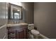 Modern powder room with granite vanity and updated fixtures at 5020 W Dickens Ave, Tampa, FL 33629