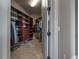 Bright walk-in closet with custom built-ins at 5020 W Dickens Ave, Tampa, FL 33629