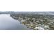 Wide aerial view of waterfront homes and neighborhood at 513 Suwanee Cir, Tampa, FL 33606