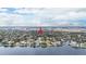 Aerial view of home near waterfront, city skyline visible at 513 Suwanee Cir, Tampa, FL 33606