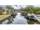 Aerial view of canal with many houses and boats at 513 Suwanee Cir, Tampa, FL 33606