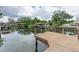 Private wooden dock provides excellent canal access at 513 Suwanee Cir, Tampa, FL 33606