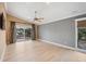 Main bedroom with light flooring and sliding glass doors at 513 Suwanee Cir, Tampa, FL 33606