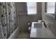 Clean bathroom with shower/tub and white vanity at 5130 Dr Martin Luther King Jr St S, St Petersburg, FL 33705