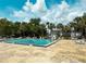 Refreshing community pool with lounge chairs at 528 Rose Apple Cir, Port Charlotte, FL 33954