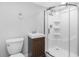 Clean bathroom with a walk-in shower and pedestal sink at 5712 17Th N Ave, St Petersburg, FL 33710