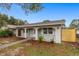 Newly renovated home with walkway and fenced backyard at 5712 17Th N Ave, St Petersburg, FL 33710