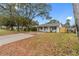 Newly renovated home with a large yard and driveway at 5712 17Th N Ave, St Petersburg, FL 33710