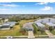 Aerial view of a house near a lake at 5720 107Th E Ter, Parrish, FL 34219