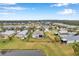 Aerial view of a house with fenced backyard at 5720 107Th E Ter, Parrish, FL 34219