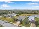 Aerial view of a house next to a lake at 5720 107Th E Ter, Parrish, FL 34219