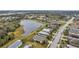 Aerial view of a house community near a lake at 5720 107Th E Ter, Parrish, FL 34219