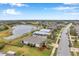 Aerial view of a house near a lake at 5720 107Th E Ter, Parrish, FL 34219